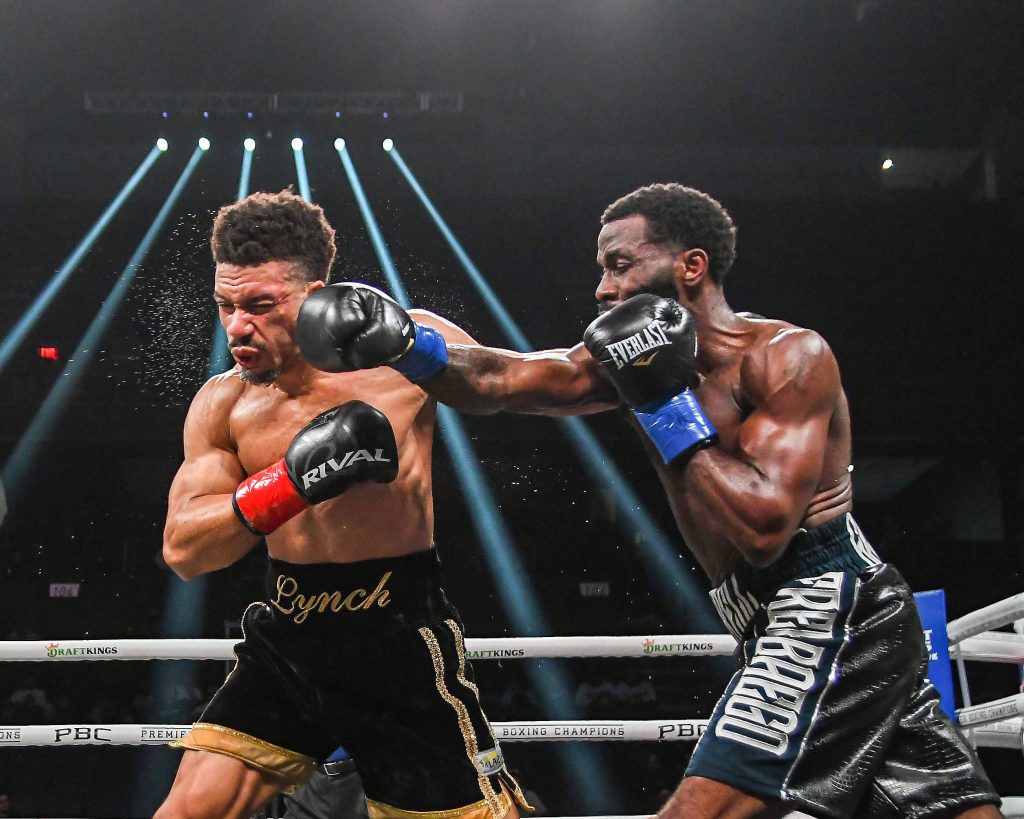 March 4, 2023, Menifee, California, USA: TERRELL GAUSHA (white trim) and BRANDYN LYNCH (gold trim) exchange punches during the Super Welterweight bout won by GAUSHA by knockout .Toyota Arena Ontario, California. Menifee USA - ZUMAc249 20230304_zsp_c249_010 Copyright: xArdiexCrenshawx