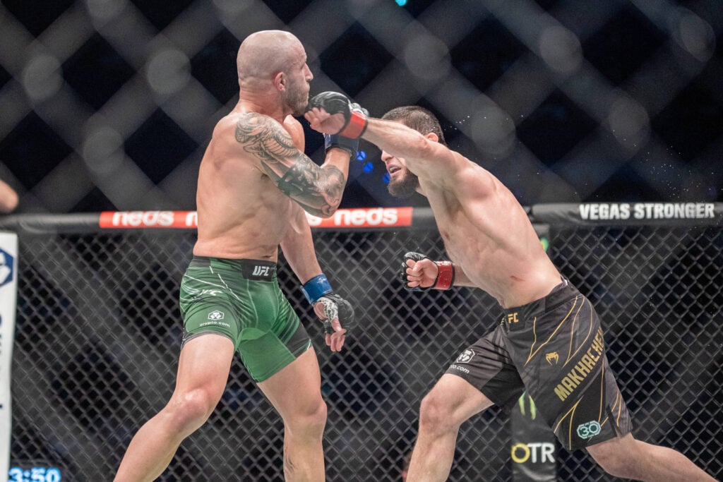 February 12, 2023, Perth, Perth, Australia, Australia: PERTH, AUSTRALIA - FEBRUARY 12: (R-L) Islam Makhachev punches Alex Volkanovski in their Lightweight title fight during the UFC 284 event at Rac Arena on February 12, 2023 in Perth, Australia. Perth Australia - ZUMAp175 20230212_zsa_p175_133