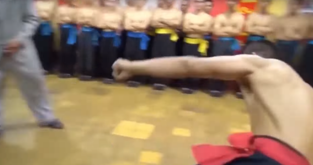 Fake martial arts master demonstrates his technique