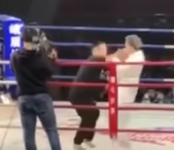 Tai Chi master faces Iron Palm master in a ring and gets shoved back with force