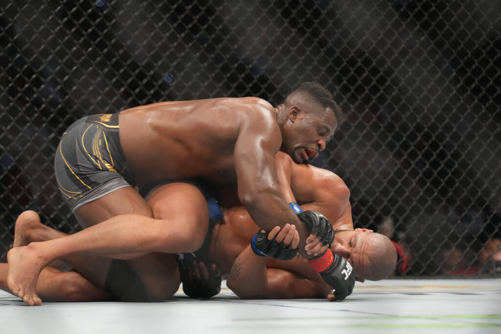 January 22, 2022, Anaheim, California, Anaheim, CA, United States: ANAHEIM, CA - JANUARY 22: Francis Ngannou (top) controls the body of Ciryl Gane in their Heavyweight championship fight during the UFC 270 event at Honda Center on January 22, 2022 in Anaheim, California, United States. Anaheim, California United States - ZUMA