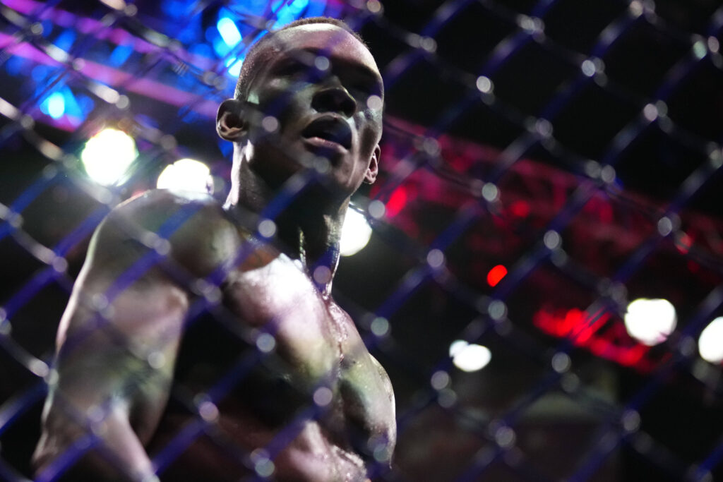 Israel Adesanya (blue gloves) reacts to defeating Alex Pereira (red gloves) during UFC 287 at Miami-Dade Arena. Miami Miami-Dade Arena Florida USA,