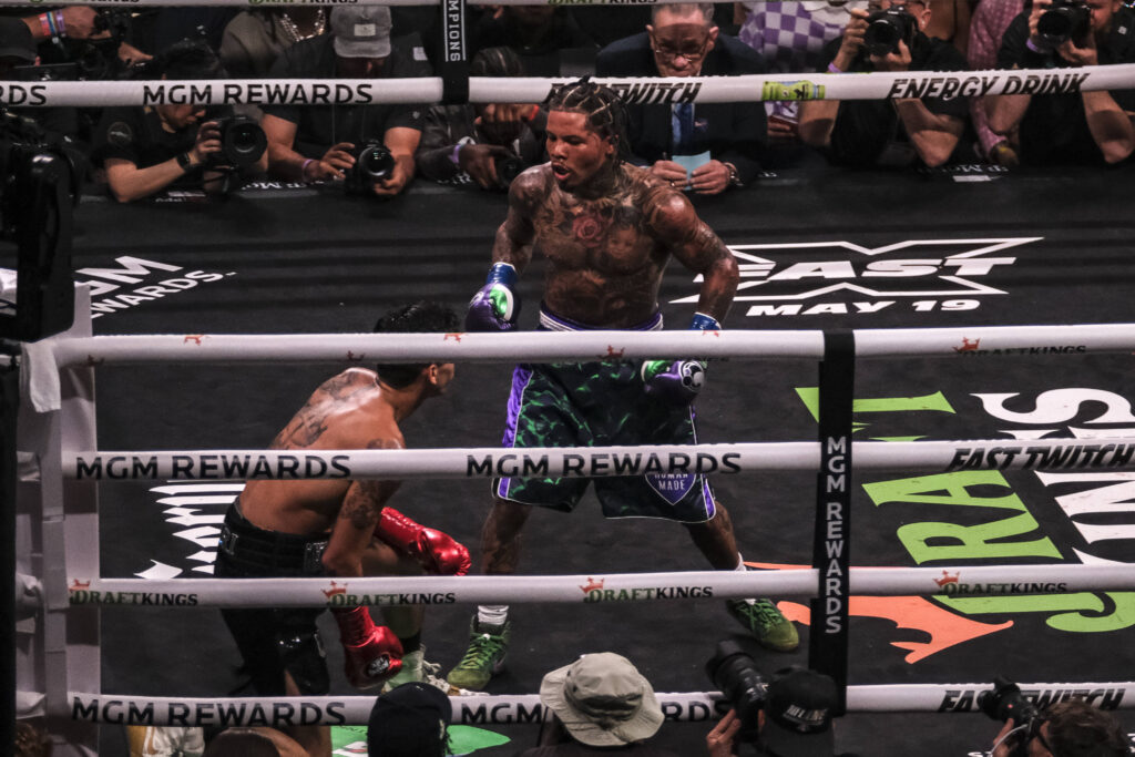 April 22, 2023, Las Vegas, Nevada, USA: Gervonta Ã¢â‚¬ËœTankÃ¢â‚¬â ¢ Davis stands over his opponent Ryan Garcia while referee Thomas Taylor counts him out making Davis the winner by seventh round knockout. Las Vegas USA - ZUMAd151 20230422_znp_d151_039 
