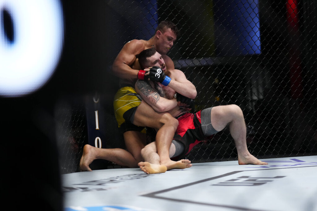 April 29, 2023, Las Vegas, NV, LAS VEGAS, NV, United States: LAS VEGAS, NV - April 29: (L-R) Caio Borralho attempts to submit Michal Oleksiejczuk in a Middleweight bout at UFC Apex for UFC Fight Night - Song v Simon on April 29, 2023 in Las Vegas, NV, United States. Las Vegas, NV United States - ZUMAp175 20230429_zsa_p175_140 