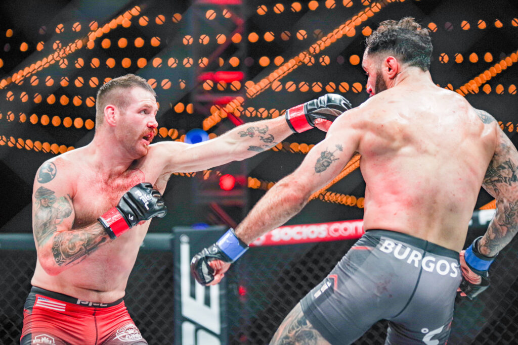 Clay Collard punches Shane Burgos during the PFL Play-Offs in NYC in August. New York City, New York, United States.