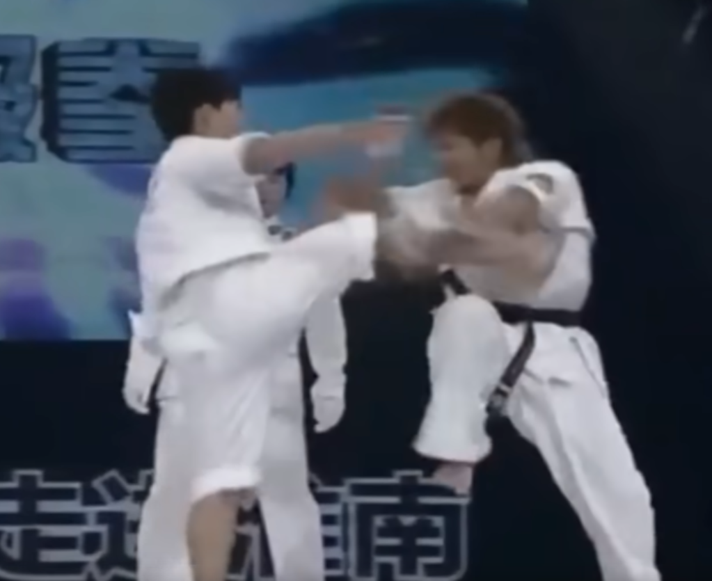 Tai Chi practitioner lands a body side kick