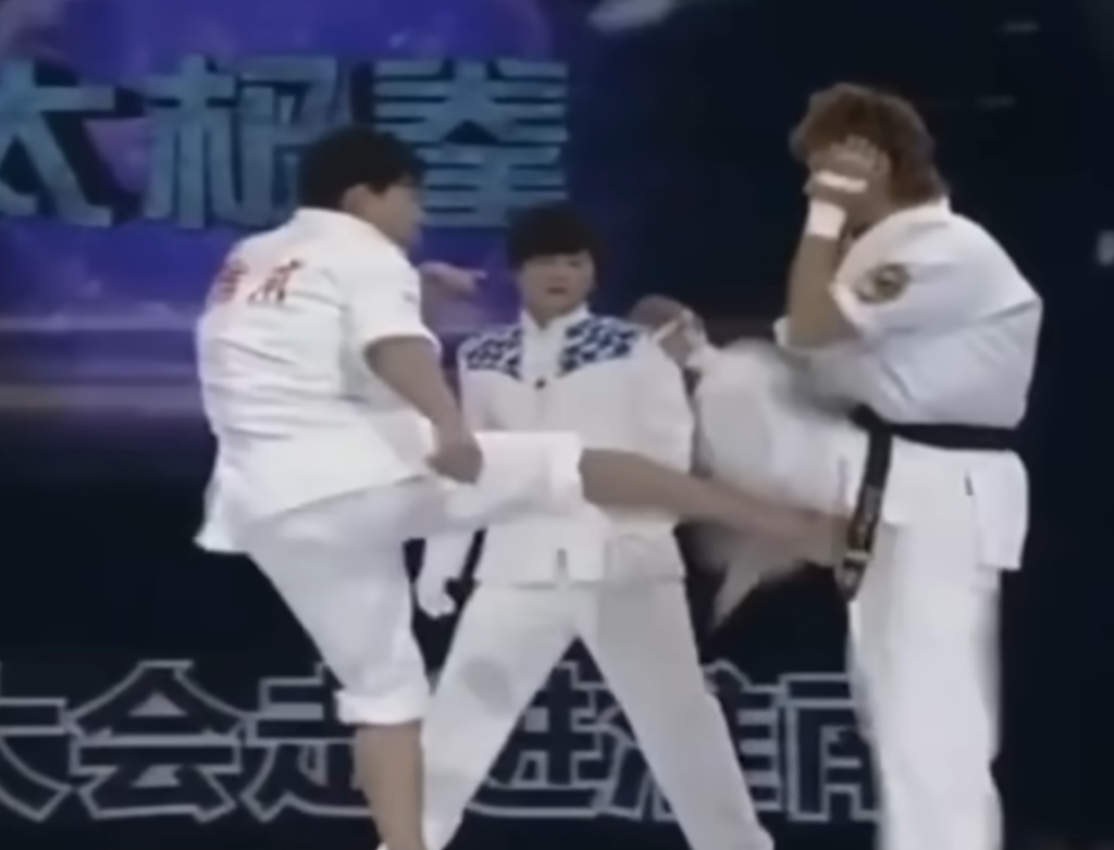 Tai Chi practitioner lands a leg kick