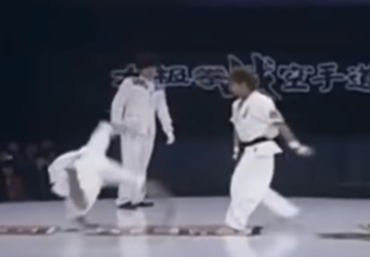 Tai Chi practitioner sets up another corkscrew kick
