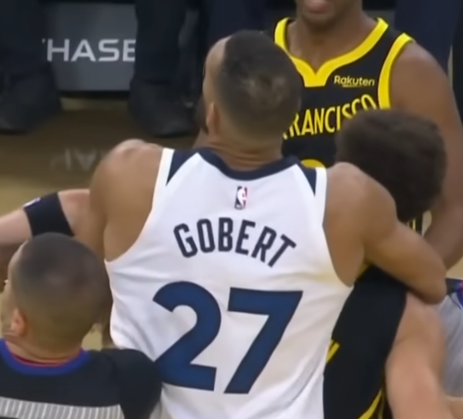 NBA player Rudy Gobert a moment before Draymond Green puts him in a chokehold.