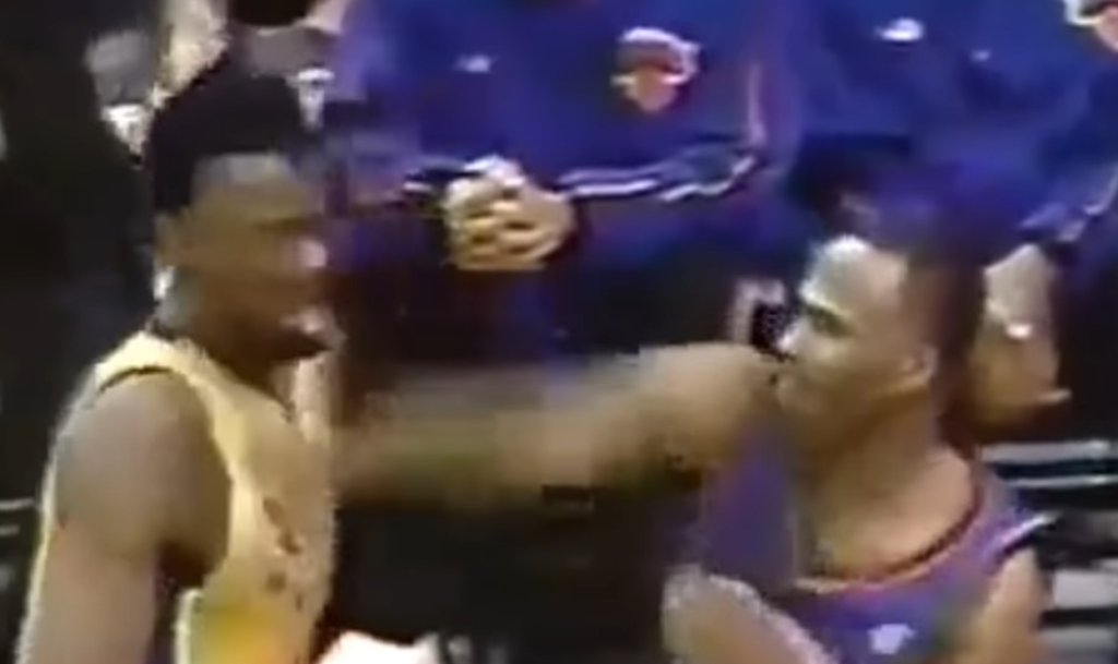 Chris Childs lands a punch on Kobe Bryant