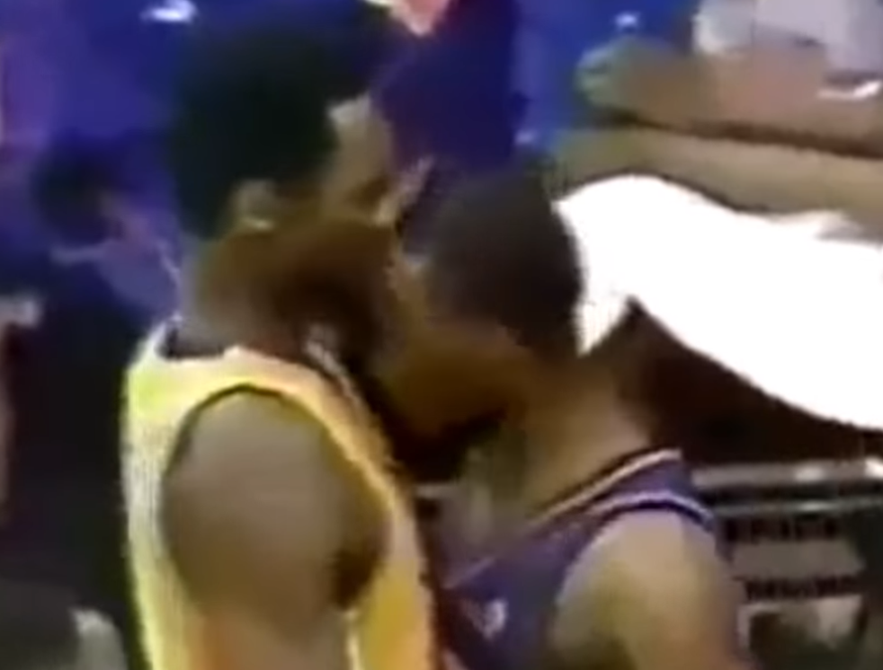 Chris Childs pushes Kobe Bryant away with his head.