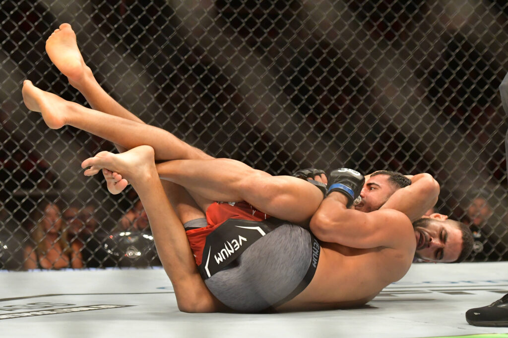 January 21, 2023, Rio de Janeiro, RJ, Rio de Janeiro, RJ, Brazil: RIO DE JANEIRO, RJ - JANUARY 21: Mounir Lazzez (blue gloves) battles Gabriel Bonfim (red gloves) in their Welterweight fight during the UFC 283 event at Jeunesse Arena on January 21, 2023 in Rio de Janeiro, RJ, Brazil. Rio de Janeiro, RJ Brazil - ZUMAp175 20230121_zsa_p175_144 