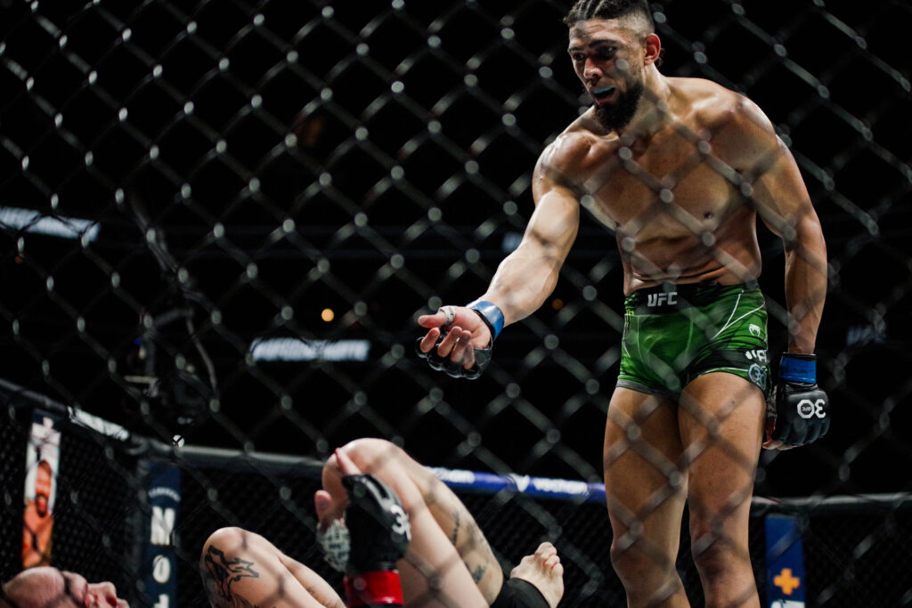 May 13, 2023, Charlotte, NC, North Carolina, USA: CHARLOTTE, NORTH CAROLINA - May 13: (L-R) Johnny Walker welcomes Anthony Smith back to his feet at UFC Fight Night: Rozenstruik vs Almeida on May 13th, 2023 at Spectrum Center in Charlotte, North Carolina, United States. Charlotte, NC USA - ZUMAp175 20230513_zsa_p175_161