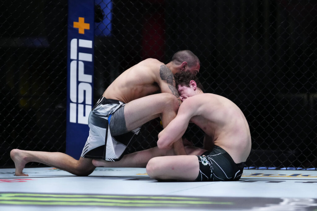 May 20, 2023, Las Vegas, Nevada, Las Vegas, NV, United States: LAS VEGAS, NV - MAY 20: (R-L) Chase Hooper controls the body of Nick Fiore in their Lightweight bout during the UFC Vegas 73 event at UFC Apex on May 20, 2023, in Las Vegas, Nevada, United States. Las Vegas, Nevada United States - ZUMAp175 20230520_zsa_p175_134 