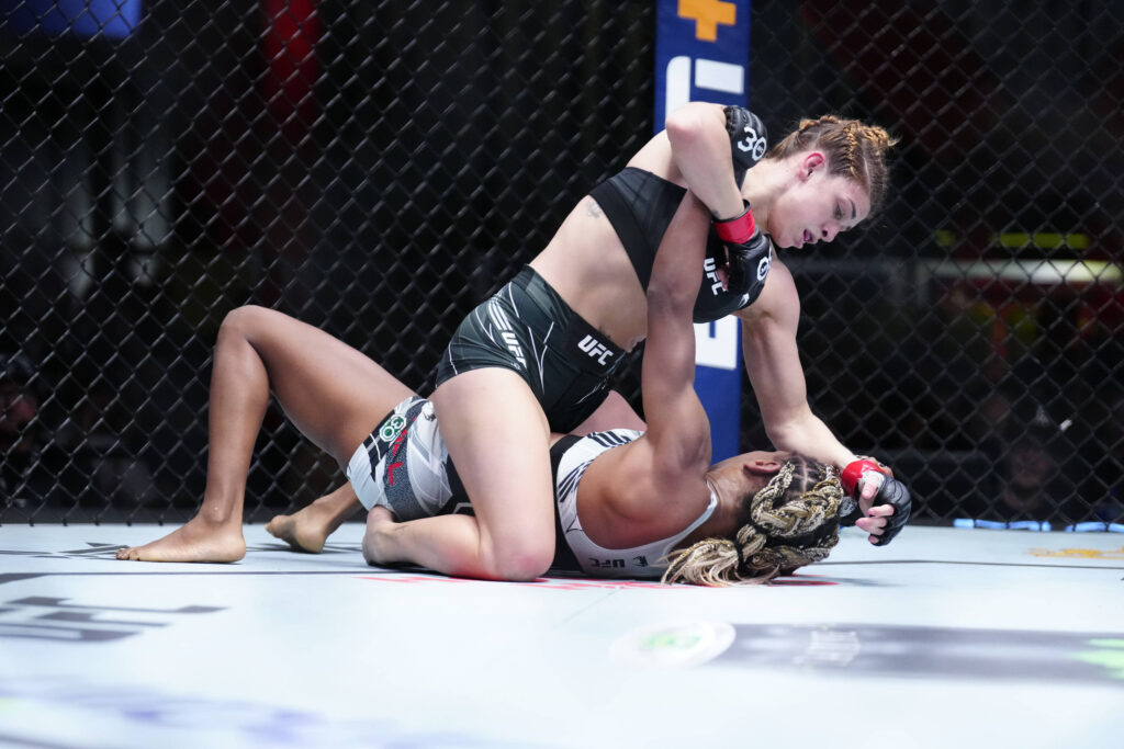 May 20, 2023, Las Vegas, Nevada, Las Vegas, NV, United States: LAS VEGAS, NV - MAY 20: Mackenzie Dern (top) controls the body of Angela Hill in their Women s Strawweight bout during the UFC Vegas 73 event at UFC Apex on May 20, 2023, in Las Vegas, Nevada, United States.
