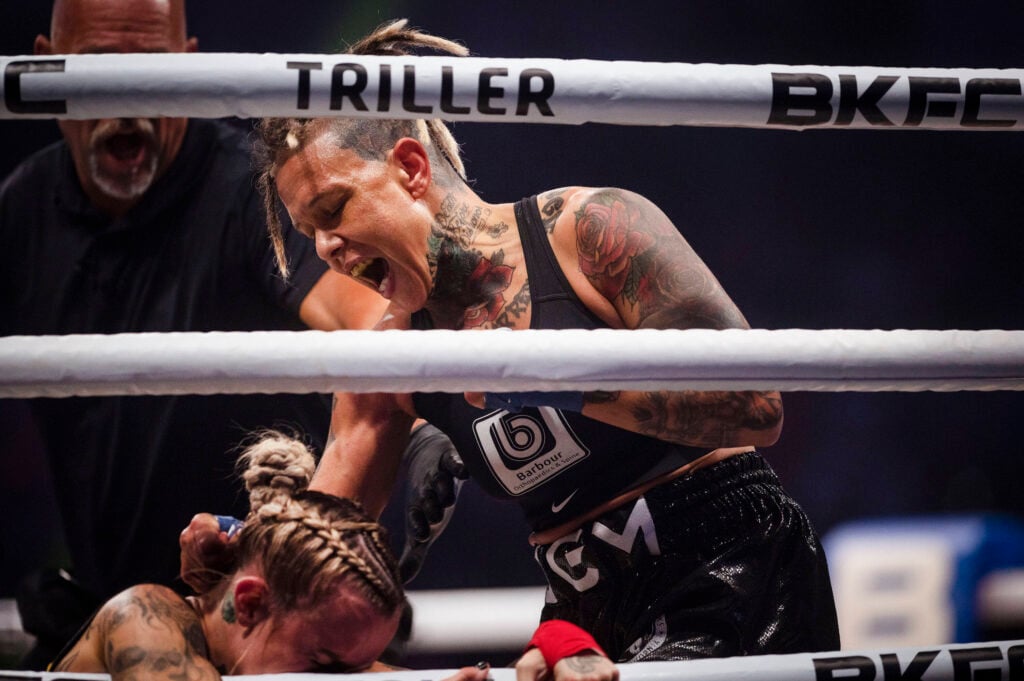 August 27, 2022, USA: Christine Ferea hits Taylor Starling to the ground during the Knuckle Fighting Championship at the Rio Rancho Events Center in Rio Rancho, N.M., on Saturday, August 27, 2022. Ferea won the fight within 47 seconds during the first round. USA - ZUMAab1_ 20220827_zaf_ab1_006 