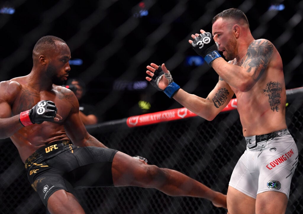 December 16, 2023, Las Vegas, Nevada, USA: LEON EDWARDS (21-3-0) of Erdington, birmingham, England (L) defeats COLBY COVINGTON (17-3-0) of Miami, Florida USA (R) by a unanimous decision (49-46, 49-46, 49-46) during UFC 296 at T-Mobile Arena, Las Vegas Las Vegas USA - ZUMAo117 20231216_zsp_o117_040 
