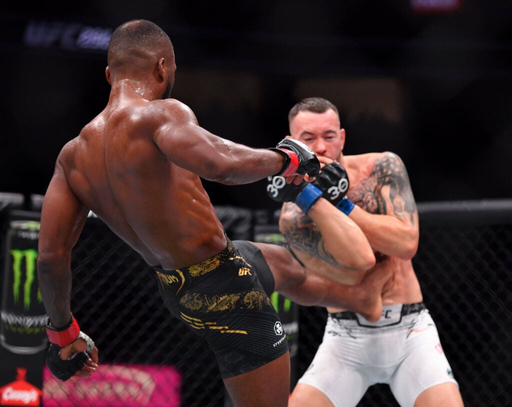 December 16, 2023, Las Vegas, Nevada, USA: LEON EDWARDS (21-3-0) of Erdington, birmingham, England (L) defeats COLBY COVINGTON (17-3-0) of Miami, Florida USA (R) by a unanimous decision (49-46, 49-46, 49-46) during UFC 296 at T-Mobile Arena, Las Vegas Las Vegas USA - ZUMAo117 20231216_zsp_o117_044 