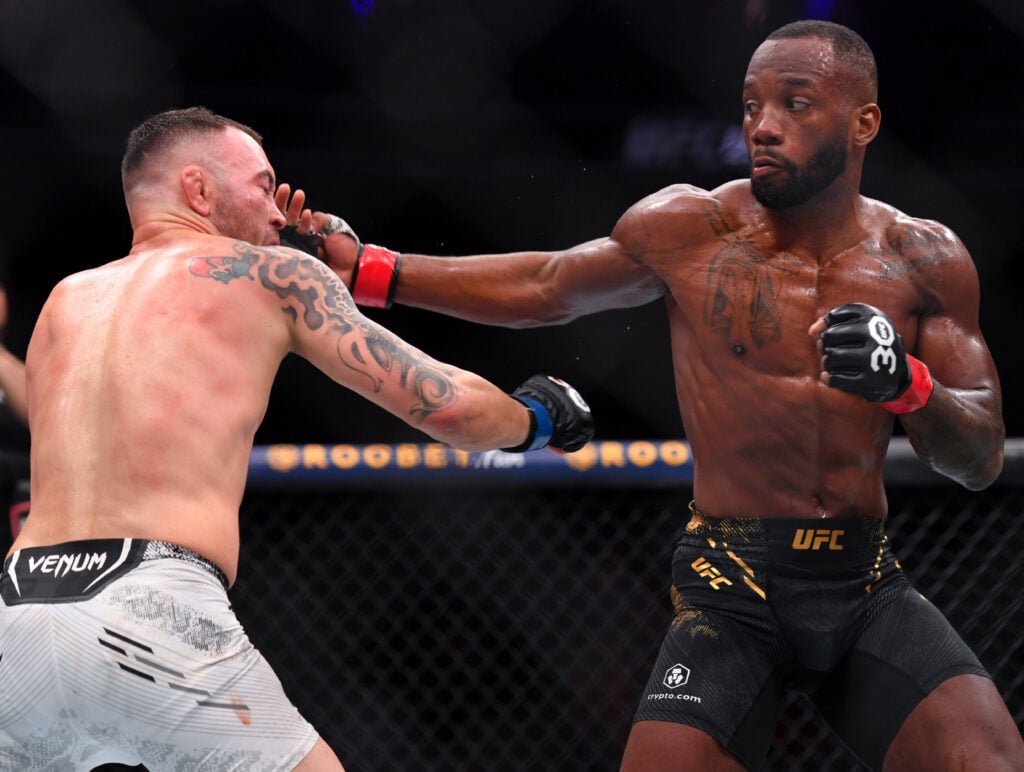 December 16, 2023, Las Vegas, Nevada, USA: LEON EDWARDS (21-3-0) of Erdington, birmingham, England (R) defeats COLBY COVINGTON (17-3-0) of Miami, Florida USA (L) by a unanimous decision (49-46, 49-46, 49-46) during UFC 296 at T-Mobile Arena, Las Vegas Las Vegas USA - ZUMAo117 20231216_zsp_o117_048 