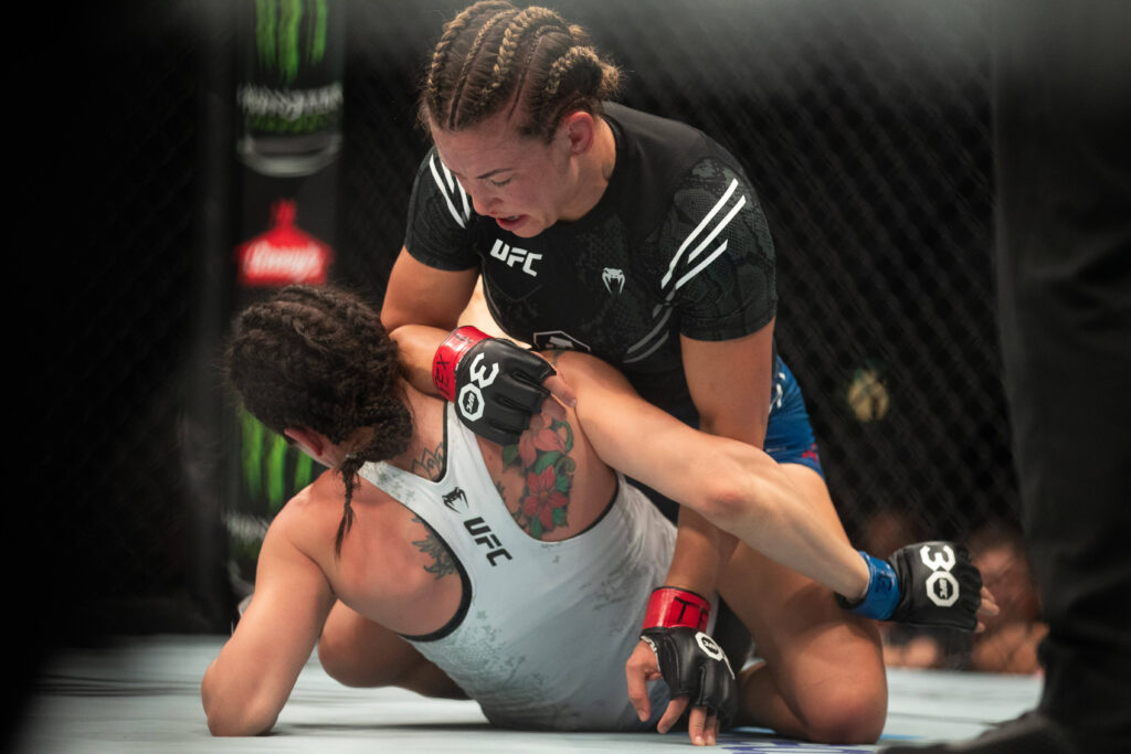 December 2, 2023, AUSTIN, TEXAS, United States: Austin, TX- Miesha Tate put down Julia Avila in Women s Bantamweight Bout during UFC FIGHT NIGHT event at Moody Center, Austin United States AUSTIN United States - ZUMAr187 20231202_zsp_r187_002 