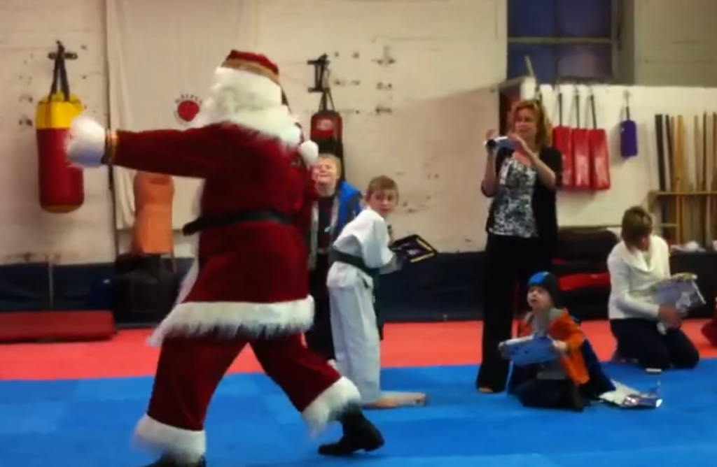 Santa Claus in the dojo doing Karate