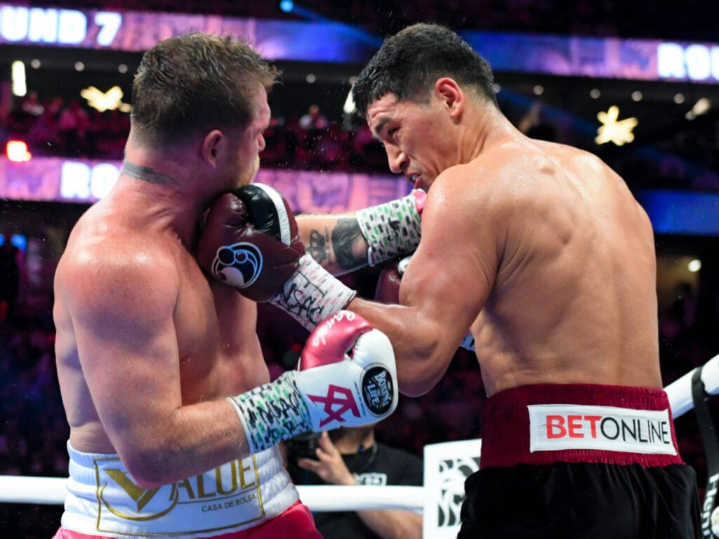 May 8, 2022, Las Vegas, Nevada, USA: DMITRY BIVOL and CANELO ALVAREZ trade clean punches in the ring during a boxing match for the WBA Light Heavyweight Championship title at the T-Mobile Arena Las Vegas. Las Vegas USA - ZUMAo117 20220508_zsp_o117_001