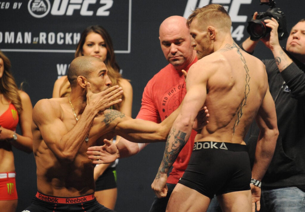 MMA: UFC 194-Aldo vs McGregor-Weigh Ins December 11, 2015; Las Vegas, NV, USA; Jose Aldo and Conor McGregor pose for photos as they are separated by UFC president Dana White during weigh-ins for UFC 194 at MGM Grand Garden Arena. Las Vegas MGM Grand Garden Arena NV USA, EDITORIAL USE ONLY PUBLICATIONxINxGERxSUIxAUTxONLY 8989915