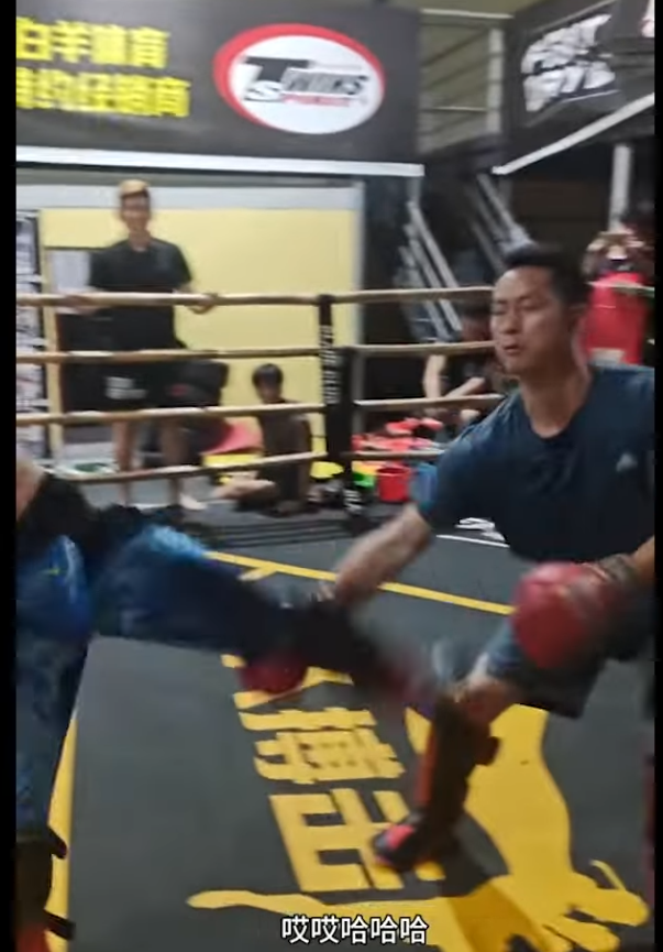 Kung Fu master has his kick caught by older opponent