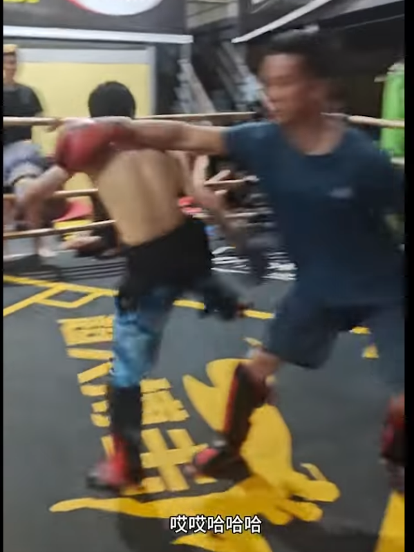 Kung Fu master barely dodges an errant punch