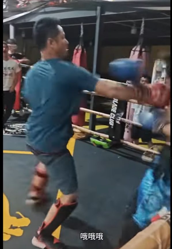 Kung Fu master gets punched in the face.