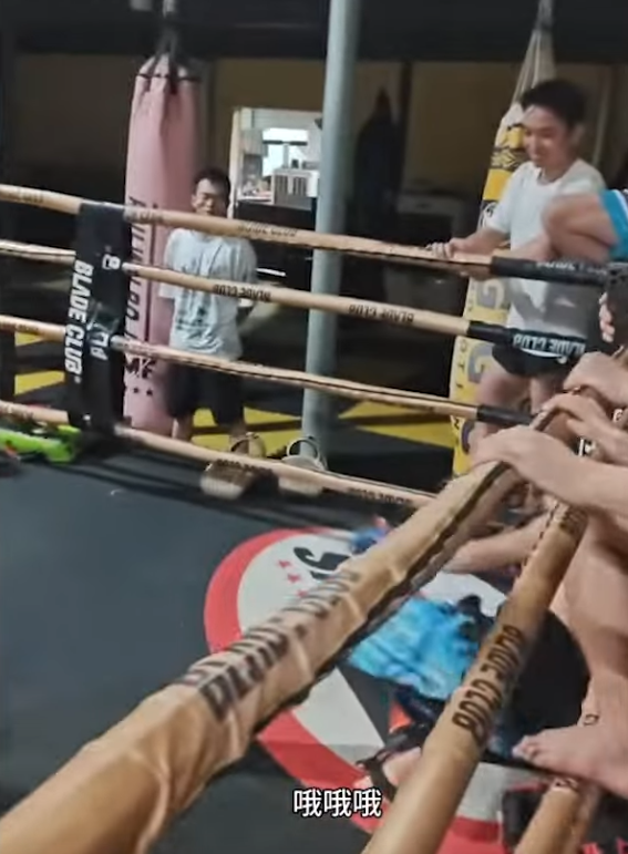 Kung Fu master gets dropped from big punch, has head against the ropes. 