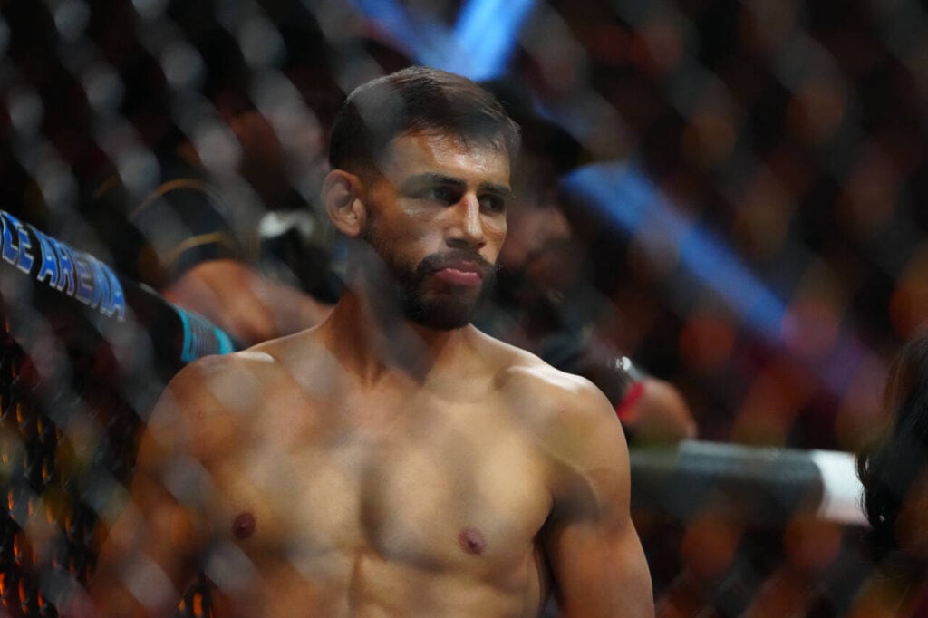 Yair Rodriguez (blue gloves) prior to the fight against Alexander Volkanovski (red gloves) during UFC 290 at T-Mobile Arena.