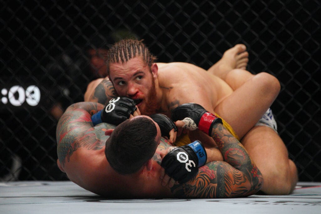 MMA: UFC Fight Night - Austin - Bellato vs Potieria Dec 2, 2023; Austin, Texas, USA; Rodolfo Bellato (red gloves) fights Ihor Potiereia (blue gloves) during UFC Fight Night at Moody Center. Austin Moody Center Texas USA, EDITORIAL USE ONLY PUBLICATIONxINxGERxSUIxAUTxONLY 20231202_szo_om2_0080